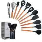 Premium 12-Piece Silicone Kitchen Utensil Set in black shown spread out on counter and in container