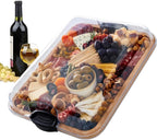 Bamboo Charcuterie & Serving Board with Fresh-Lock Clear Lid shown with meat cheese crackers and pickles inside