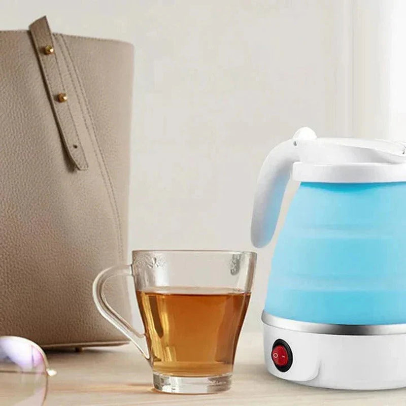 Space-Saving Collapsible Electric Kettle on kitchen counter next to a cup of tea