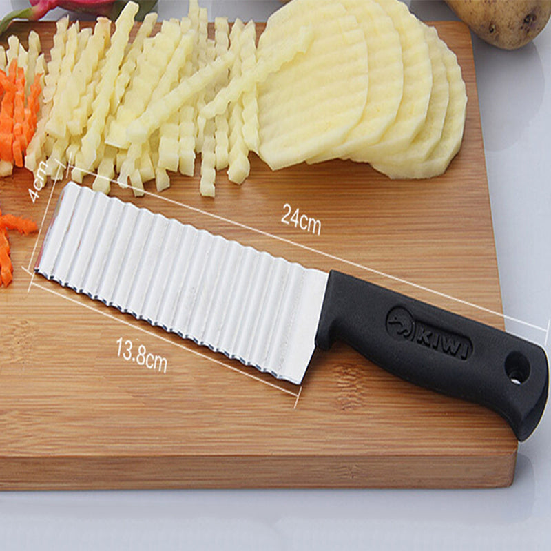 Crinkle Cut Kitchen Prep Knife on cutting board on kitchen counter cutting potatoes and carrots