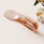 Ergonomic Mattress Lifter Tool on counter next to flower