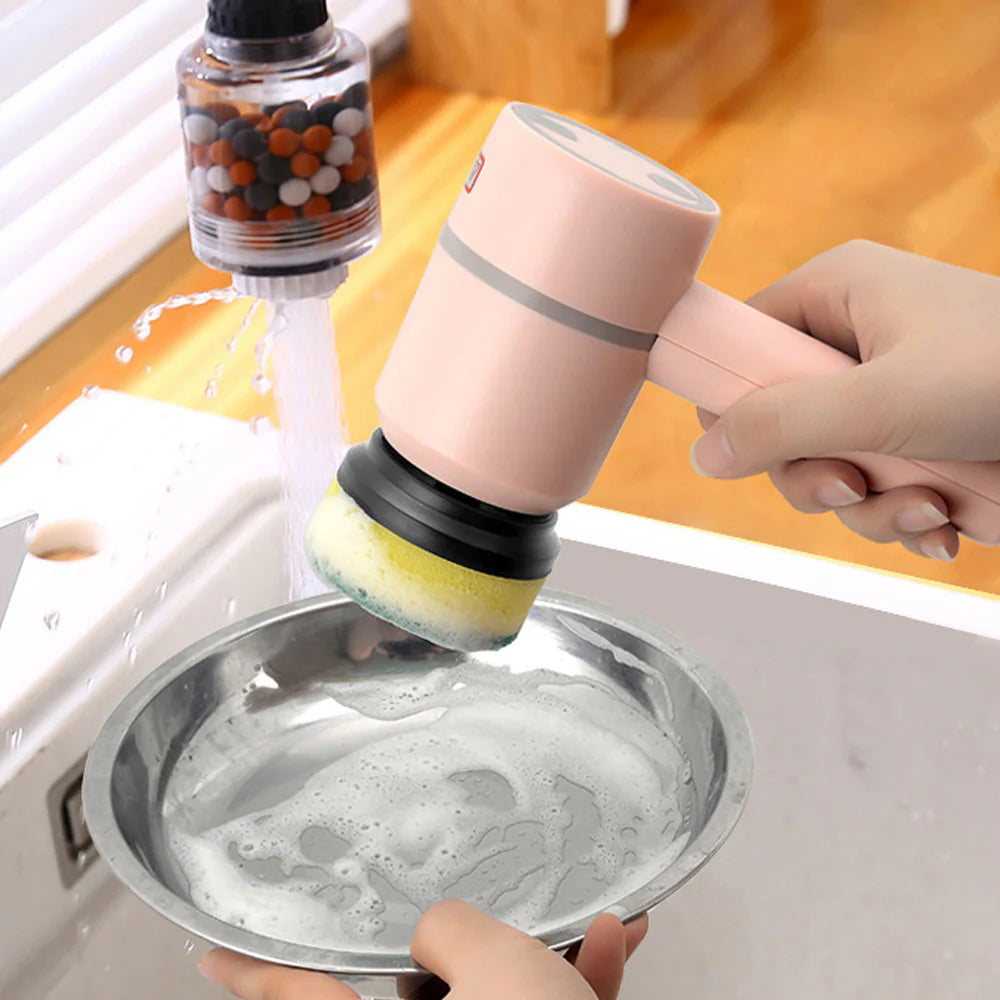 Handheld Electric Spin Scrubber washing a soapy bowl in a sink