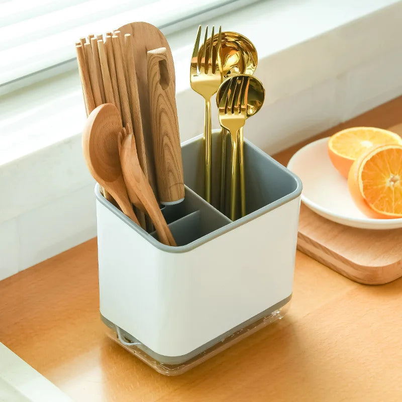 Kitchen Utensil Organizer with Drain Tray
Kitchen utensil organizer, Utensil holder with drain tray, Cutlery organizer, Kitchen cutlery drainer, Spoon and fork holder, Chopstick organizer, Countertop utensil holder, Kitchen drying organizer, Plastic utensil organizer, Sink utensil caddy, Kitchen storage organizer, Three-compartment utensil holder, Kitchen countertop organizer, Utensil drying rack
