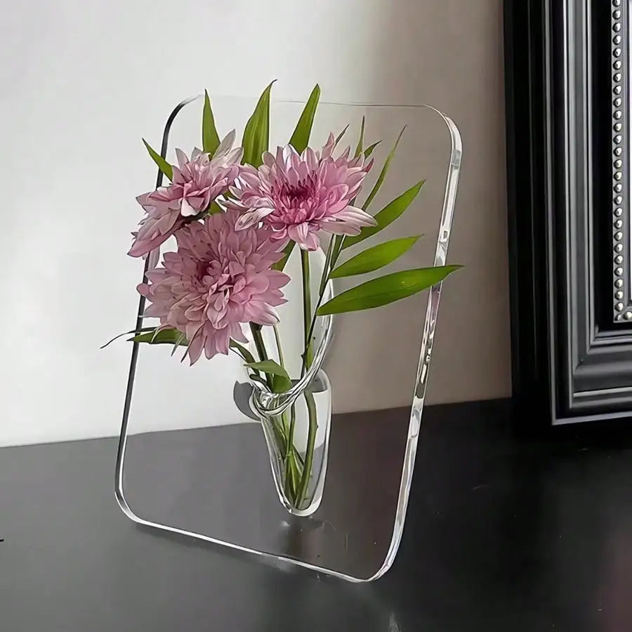 Modern Acrylic Frame Flower Vase
Acrylic flower vase, Clear acrylic vase, Modern flower vase, Transparent flower vase, Picture frame vase, Decorative acrylic vase, Minimalist flower vase, Contemporary vase, Tabletop flower vase, Home décor vase, Floral display vase, Modern centerpiece vase, Unique flower vase, Acrylic home décor